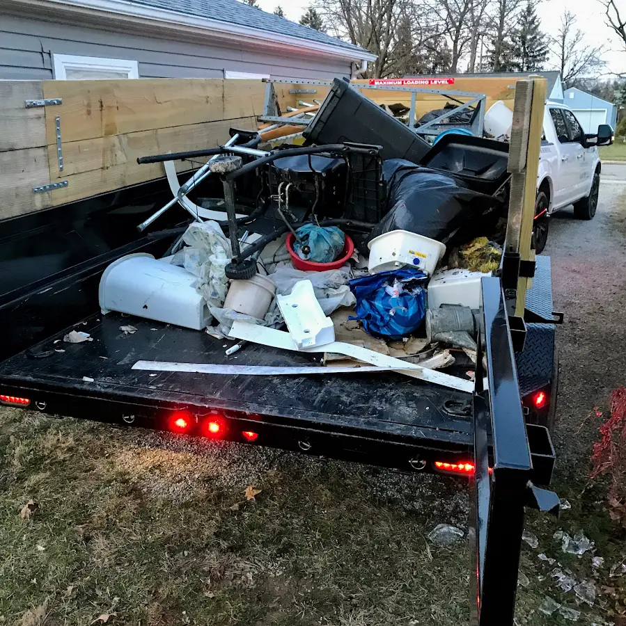 Roll-off dumpster delivered to a residential driveway in Sanford