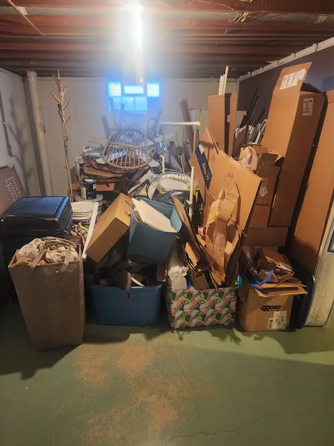 Roll-off dumpster container at job site for 2 Yard Dumpster Rental in Sanford